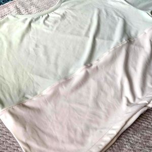 ZYIA Nyanza Cinch Crop Long Sleeve